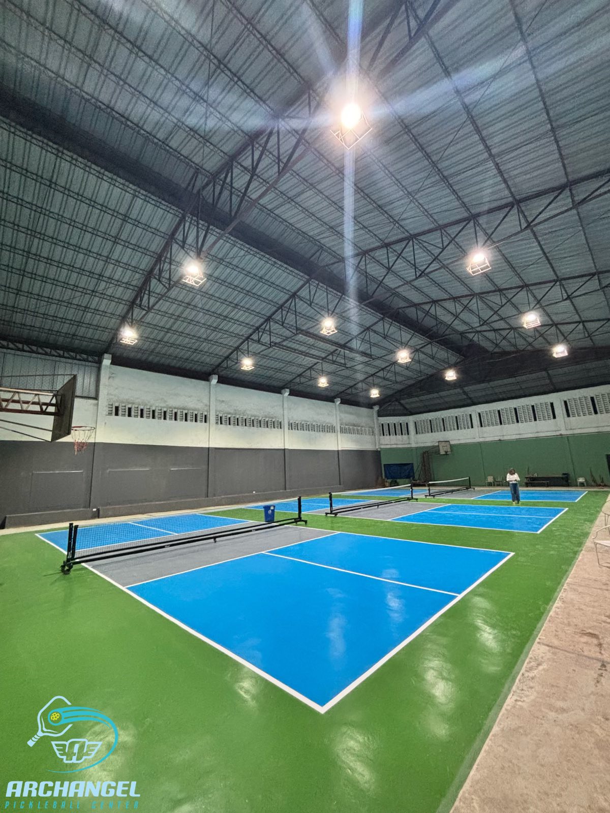 Archangel Pickleball Center — branded indoor pickleball courts