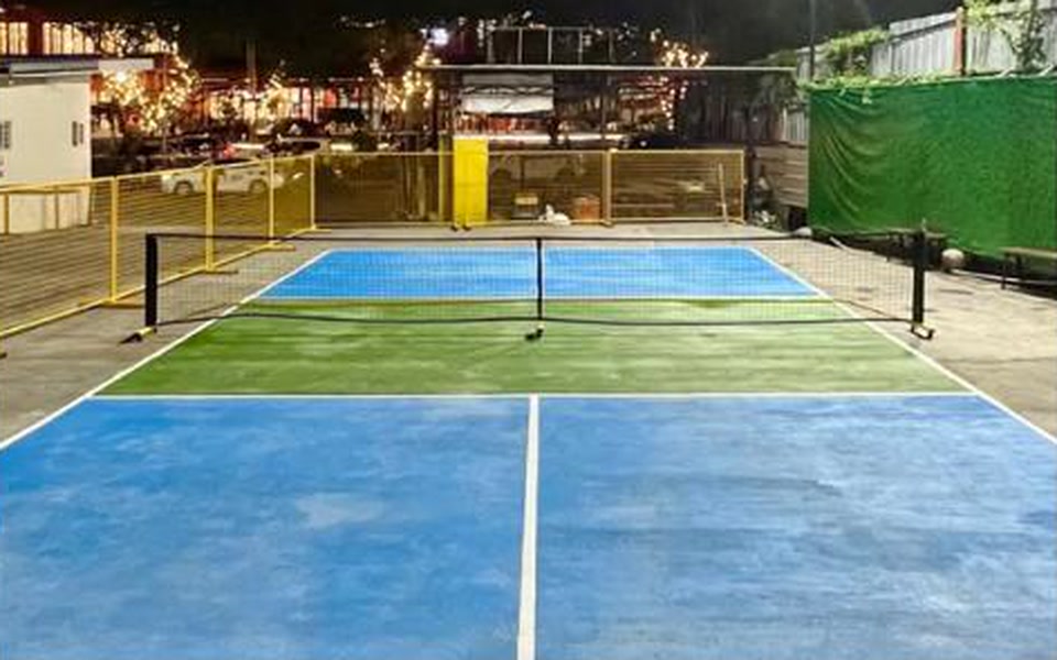 G Spot Food Park outdoor pickleball court at night