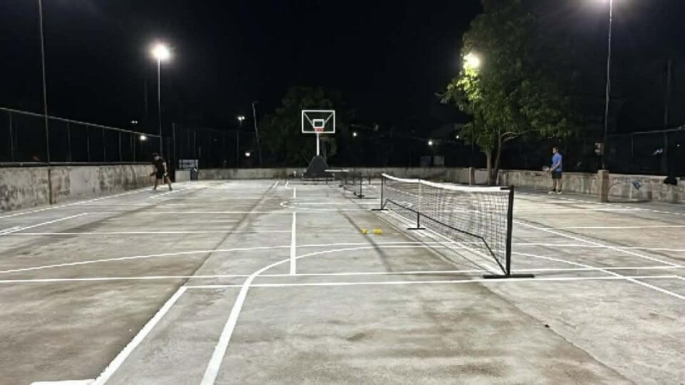 HillHouse Liloan — outdoor pickleball court under lights