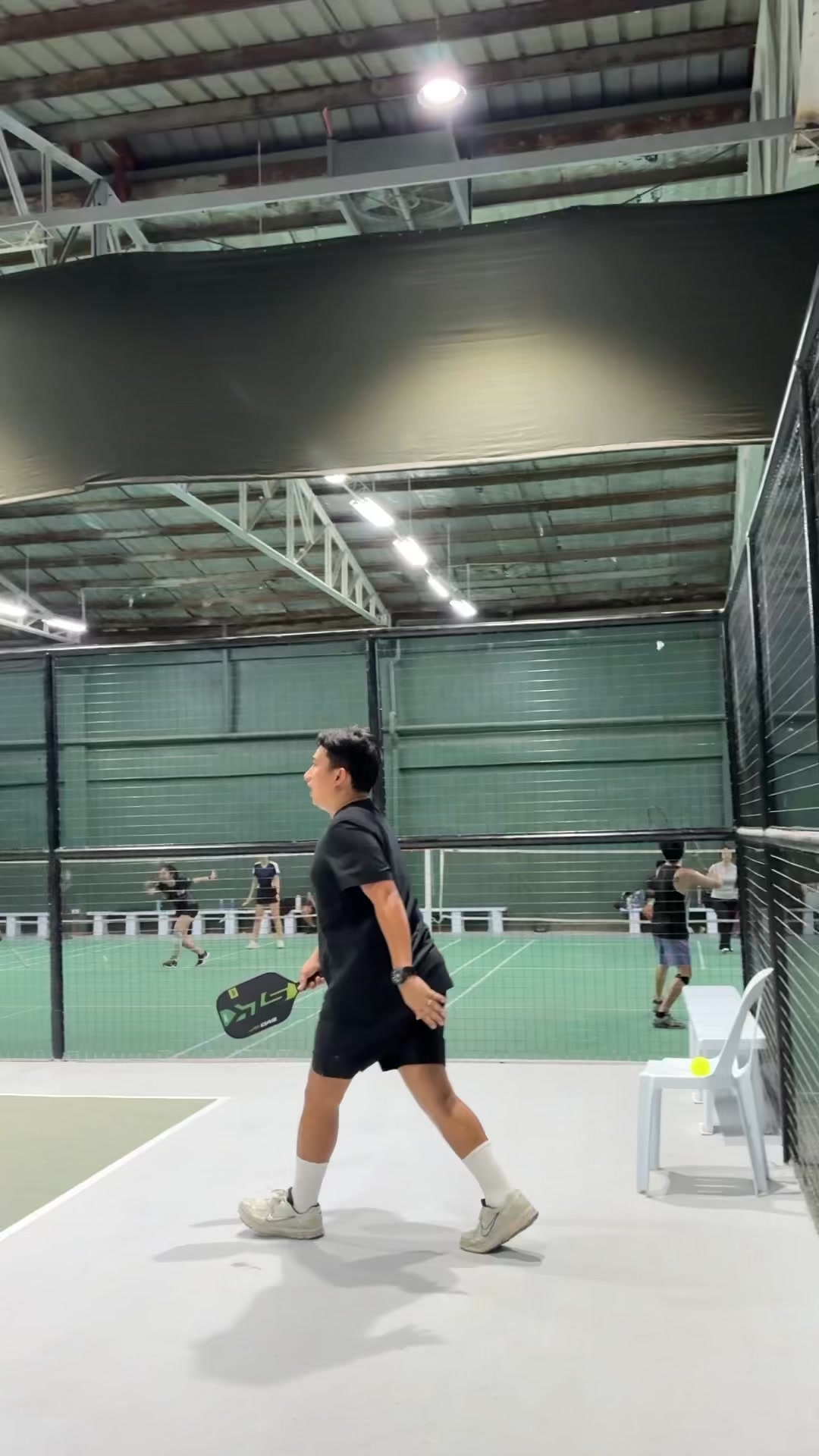 Hoops and Racket — official new-court video still showing indoor pickleball play