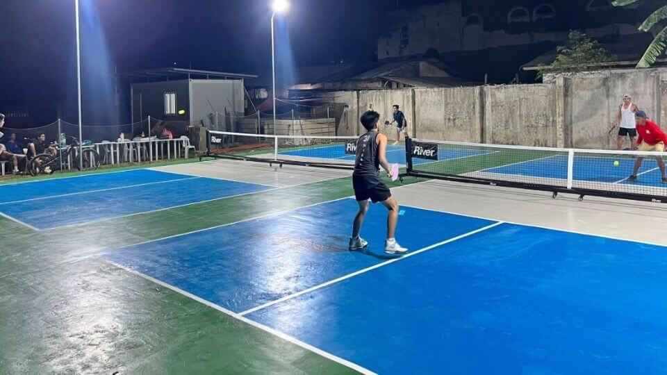 J-Cob's Cosina Bar & Sports Hub — outdoor pickleball court in play