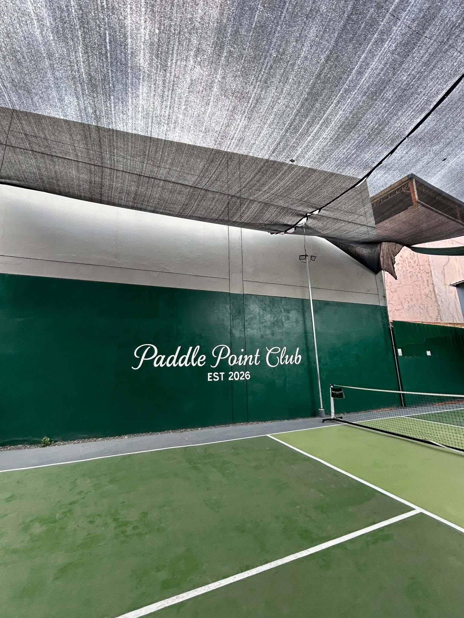 Paddle Point Club — branded outdoor pickleball court and net